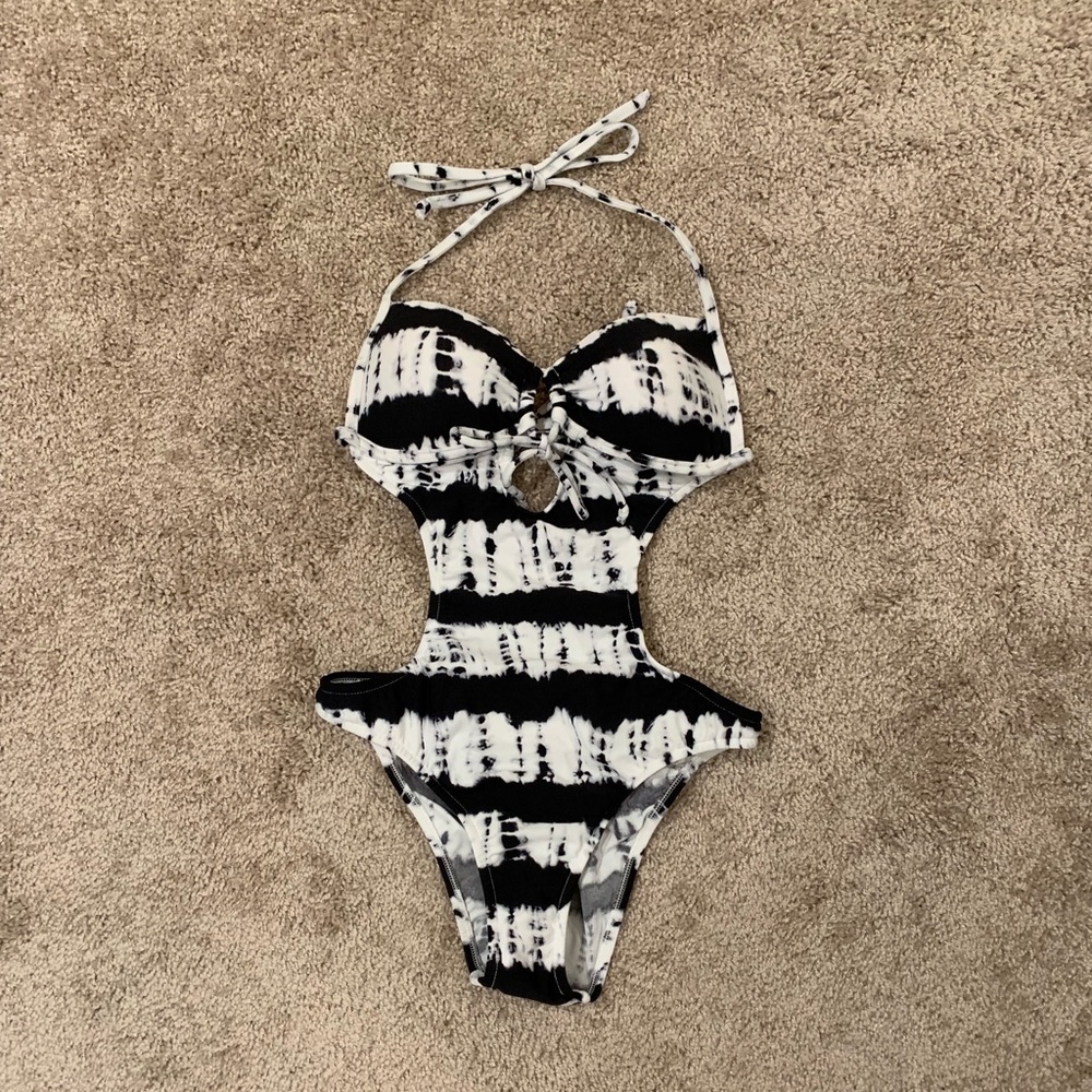 One-piece swimsuit by Venus.